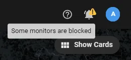 Bell icon with a tooltip reading Some monitors are blocked, next to the Show Cards button
