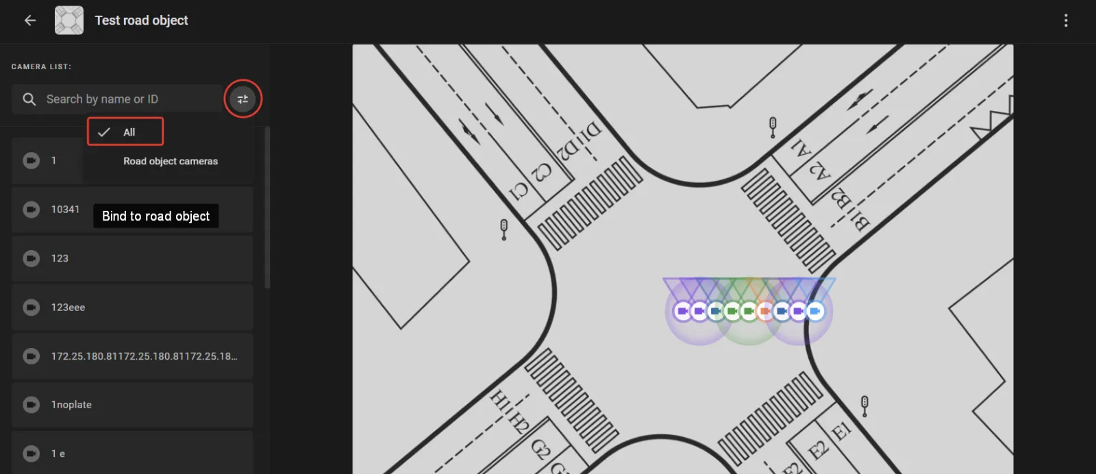 Road object configuration screen with the intersection diagram and camera list, camera filter set to All, and the Bind to road object option