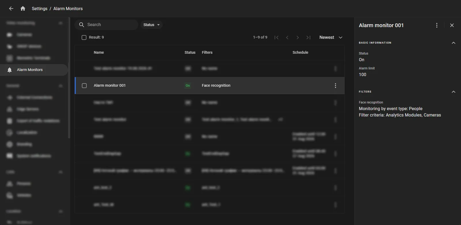 Alarm Monitors list with a side panel showing basic information and filters for the selected monitor