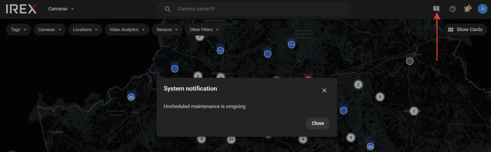 Main map screen with the active notification indicator highlighted in the top toolbar and a System notification pop-up displaying the published message